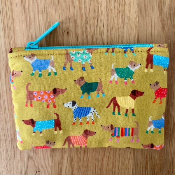 Small zipped fabric purse, pouch, make up bag, gold with fun dogs print.