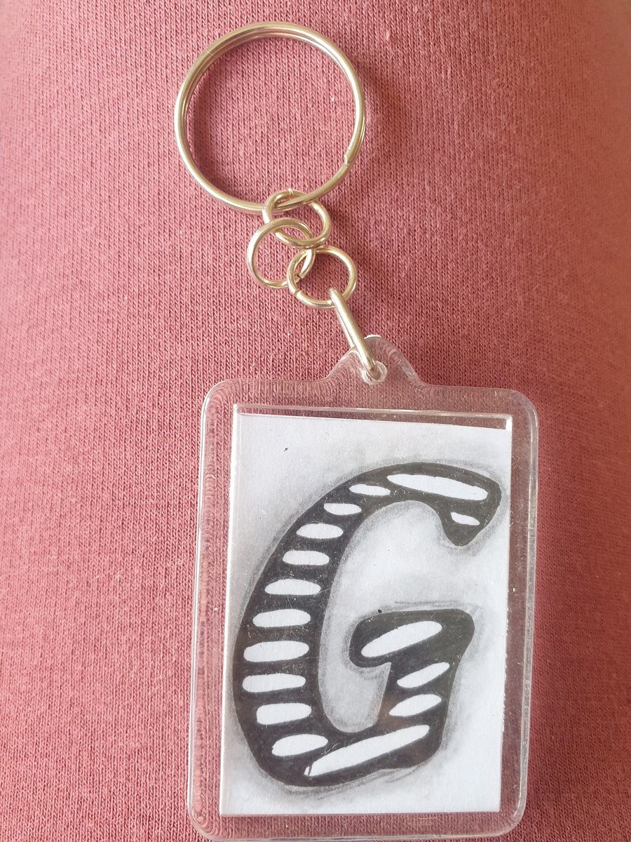Hand drawn initial "G" keyring.