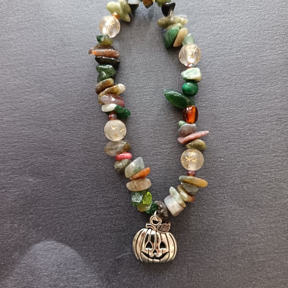 Elasticated moss agate and assorted bead bracelet with silver pumpkin charm 