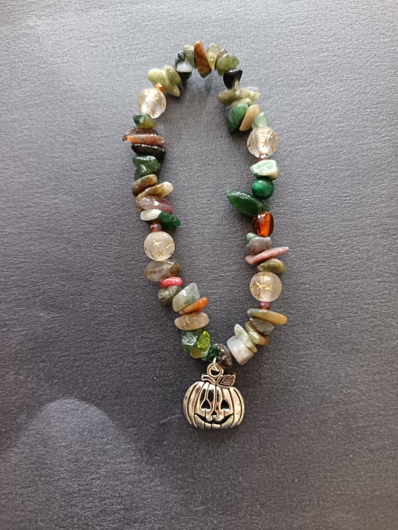 Elasticated moss agate and assorted bead bracelet with silver pumpkin charm 
