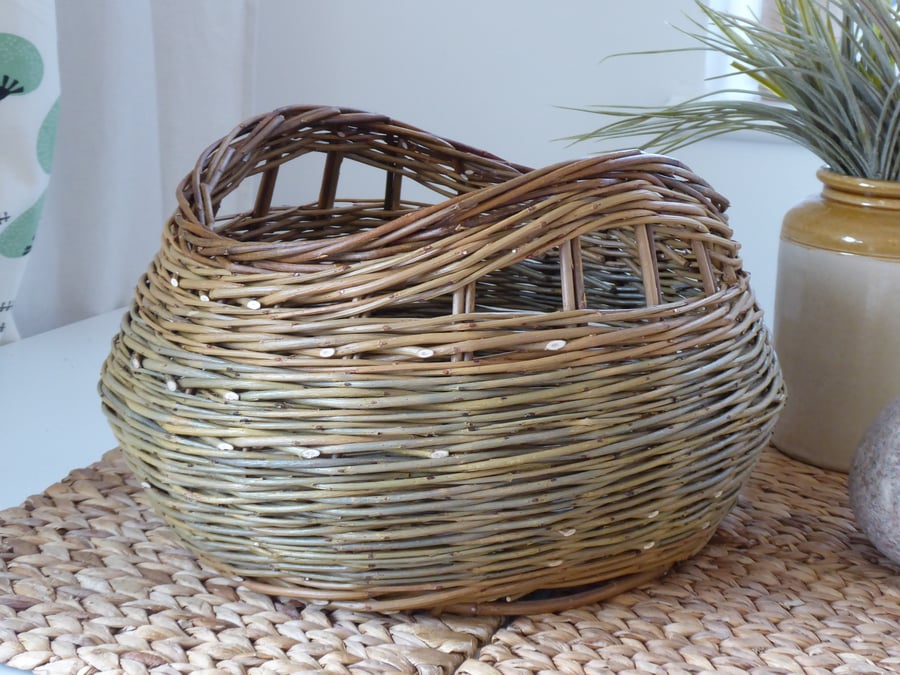 A handmade willow basket for storage or interior decoration