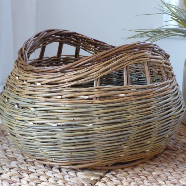 A handmade willow basket for storage or interior decoration
