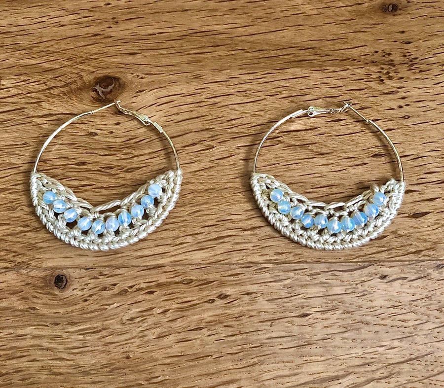 Hello October...silver plated hoop earrings with crochet and opal design.
