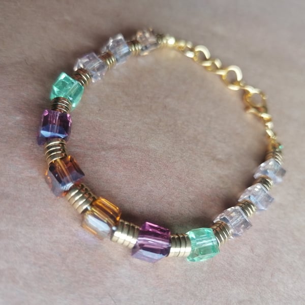 Celebration bracelet, hematite mix, coloured glass beads. 