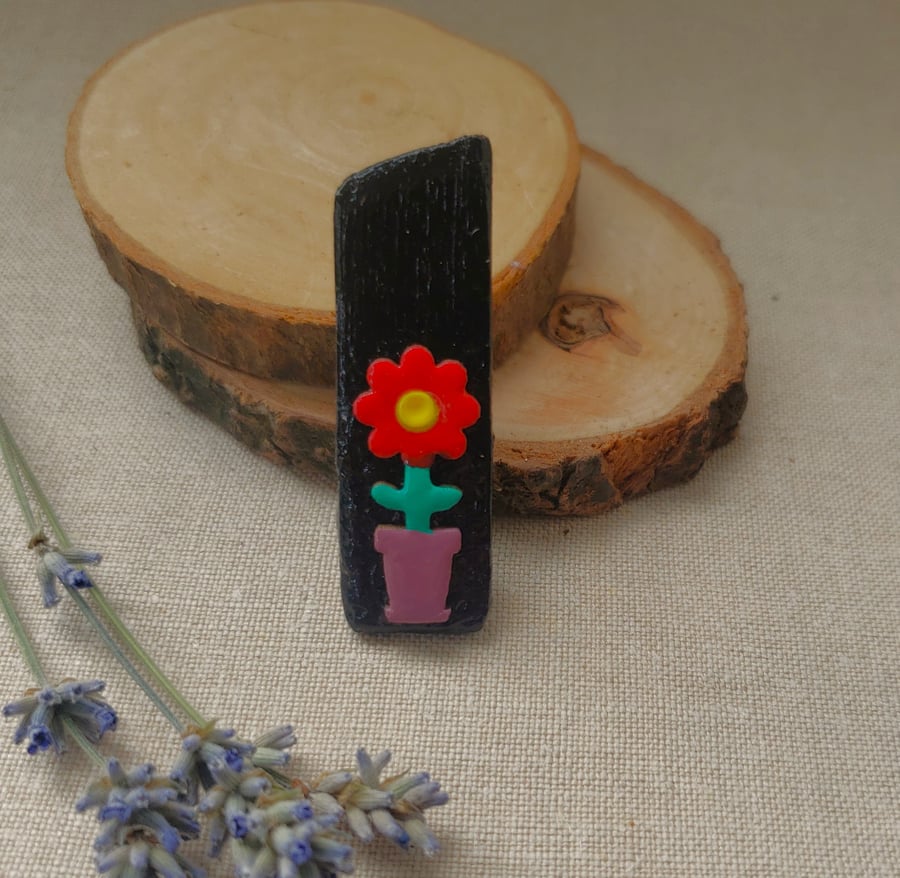Bright wooden flower brooch