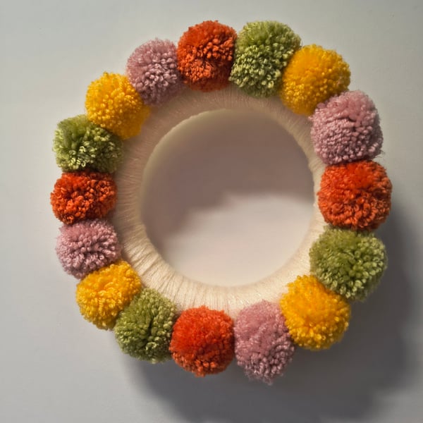 Autumn pom pom wreath in mid century colours. FREE POSTAGE