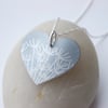 Silver heart pendant necklace with dandelion seeds