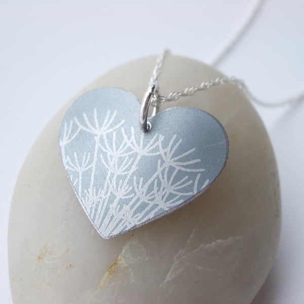 Silver heart pendant necklace with dandelion seeds