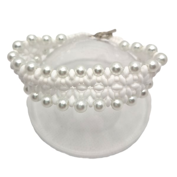 White beaded cuff bracelet with faux pearl edges perfect for a bride
