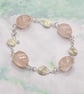 Twisted rose quartz nugget bracelet with wire spiral charms - Image 2