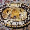 Oval slip ware dish with hand painted bee skep