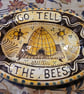 Oval slip ware dish with hand painted bee skep