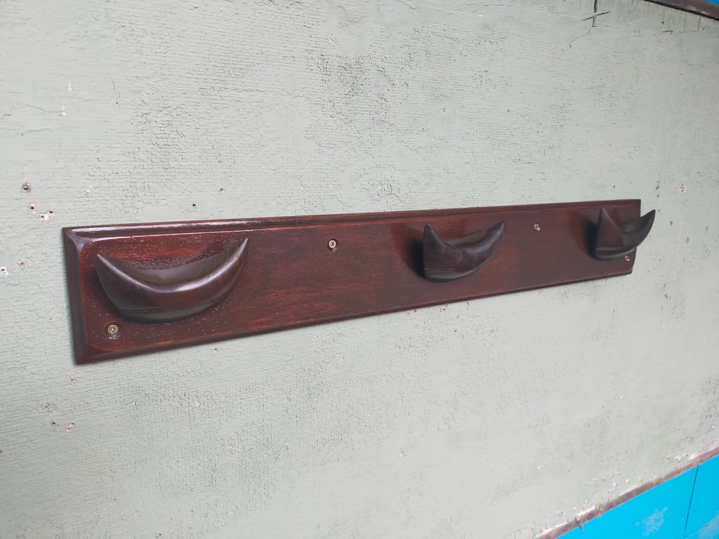 Unique Little Devils coat rack