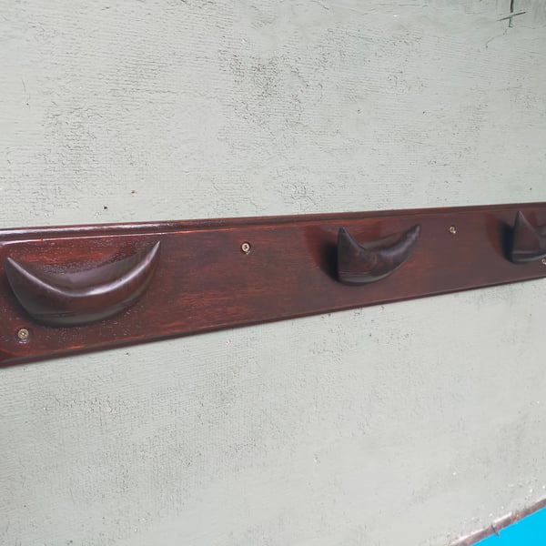 Unique Little Devils coat rack