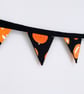 Orange pumpkins on black cotton double sided fabric mini bunting.