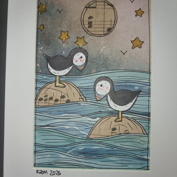 Quirky art, original art, paper art. Coastal picture of two puffins under moon