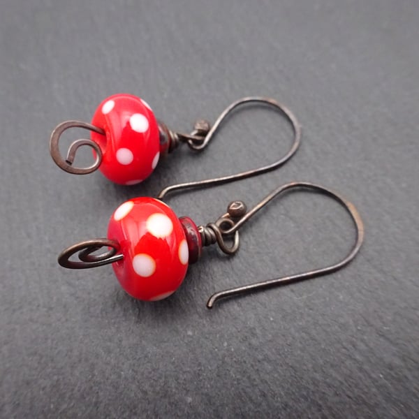 red polka dot lampwork glass earrings, copper jewellery