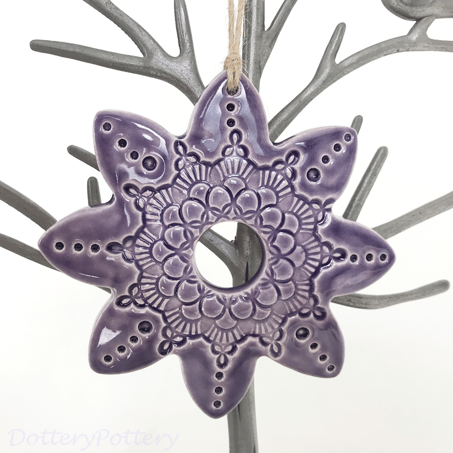 Ceramic flower decoration purple