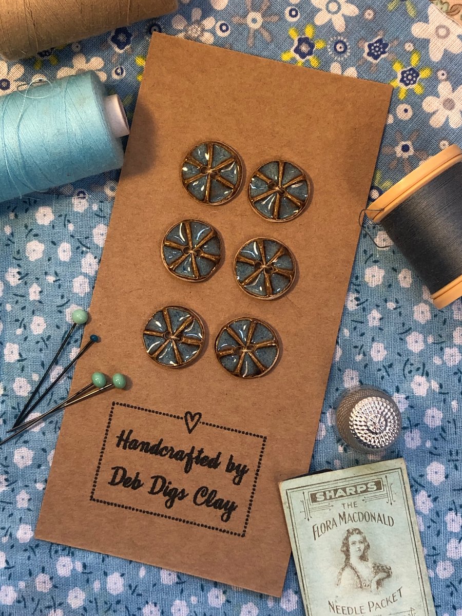 Set of 6 small handcrafted ceramic ‘spoke’ buttons in rutile blue