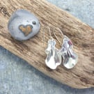 Silver folded clam shell inpsired dangly earrings