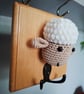 Crocheted sheep head on wooden board with hooks - Image 3
