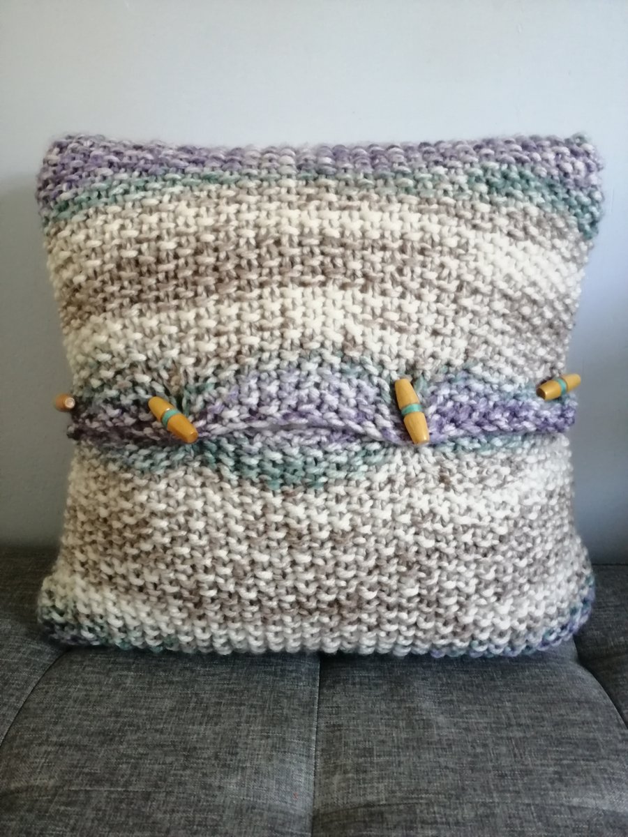 Hand knitted chunky colourful cushion 