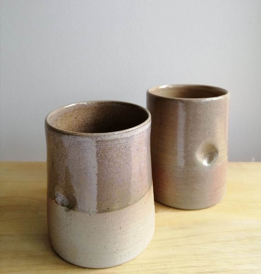 Beautiful handmade thrown stoneware pottery woodfired tumbler with shell dimples