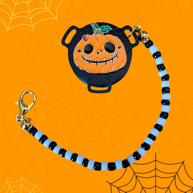 Pumpkin black SIP valve cap with beaded keeper