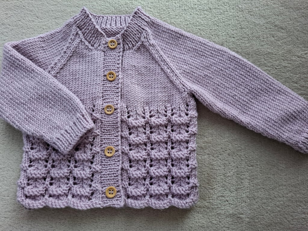 Baby girls cardigan to fit approx 6-12 months hand-knitted in lilac baby yarn 