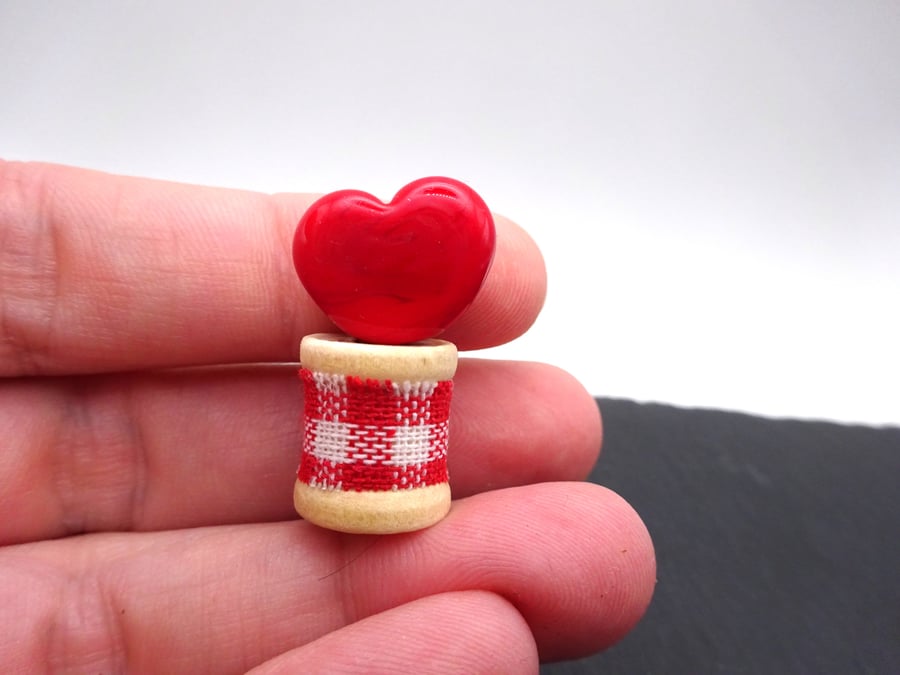 red glass heart bobbin