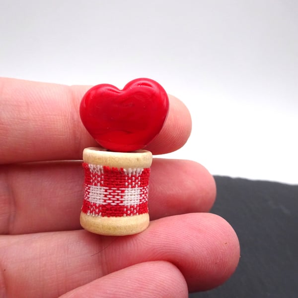 red glass heart bobbin