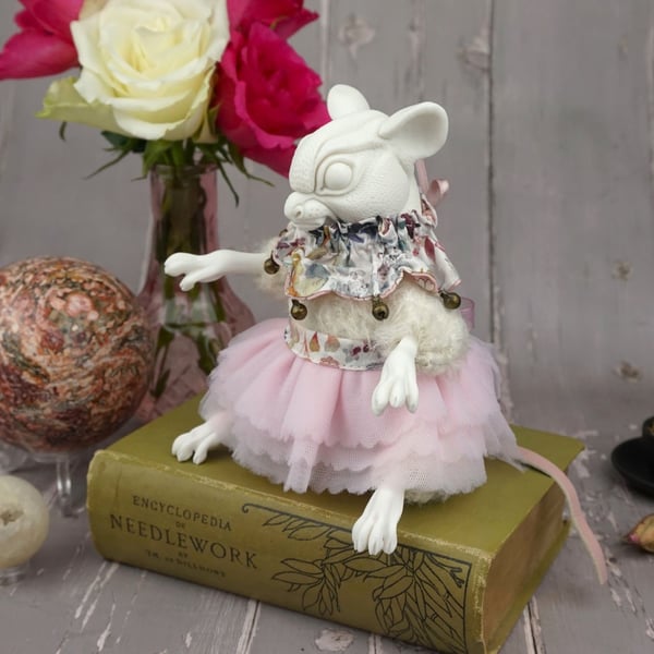 'Elicia', a porcelain and textile mouse doll.