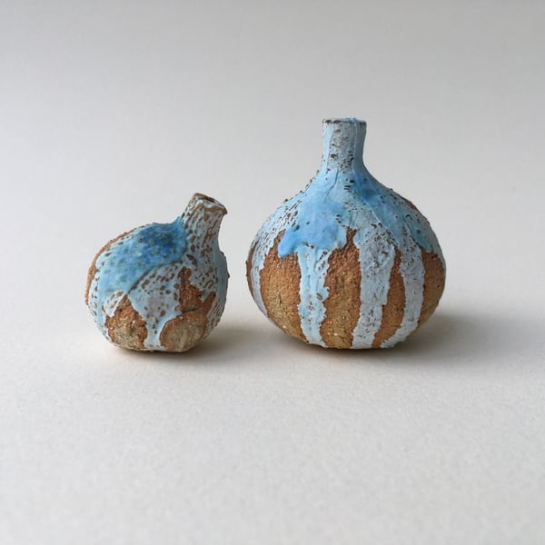 A Pair of Small Ceramic Bottles 