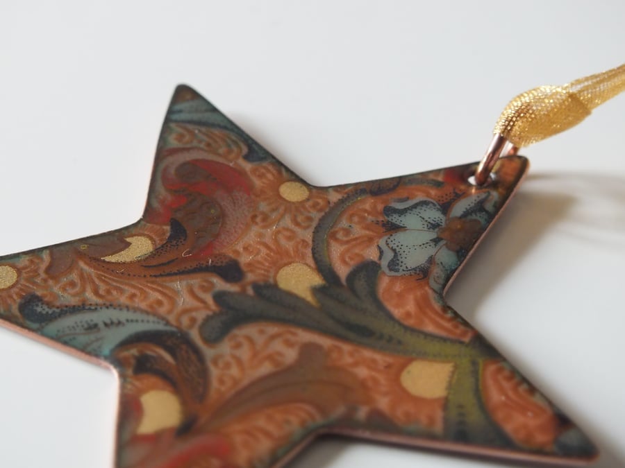 Patterned enamelled copper star
