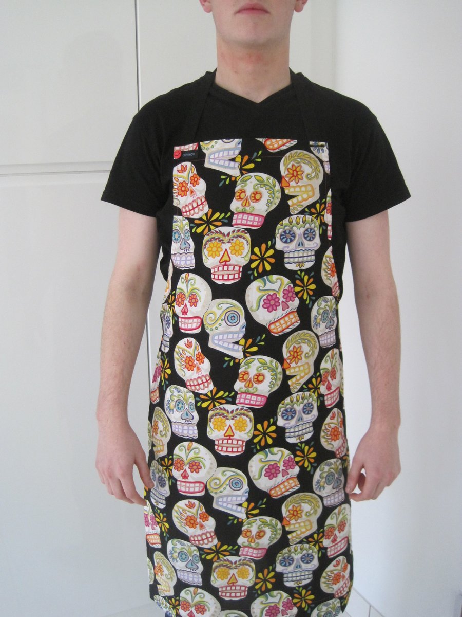 GAYPRONS - Aprons in sparkly Day of the Dead -' fabric by Alexander Henry