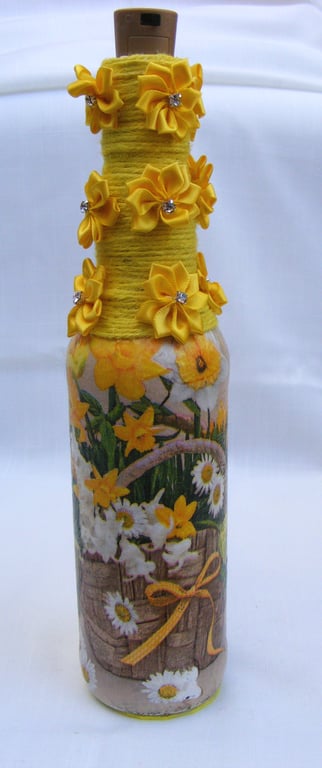Daffodil Decoupaged glass bottle lamp.