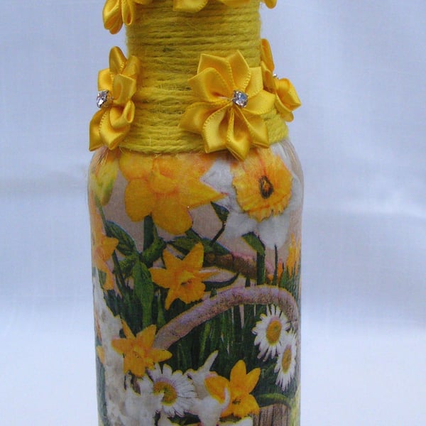 Daffodil Decoupaged glass bottle lamp.
