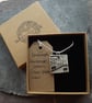 Handmade Ceramic Landscape pendant in black, white and grey - Image 6
