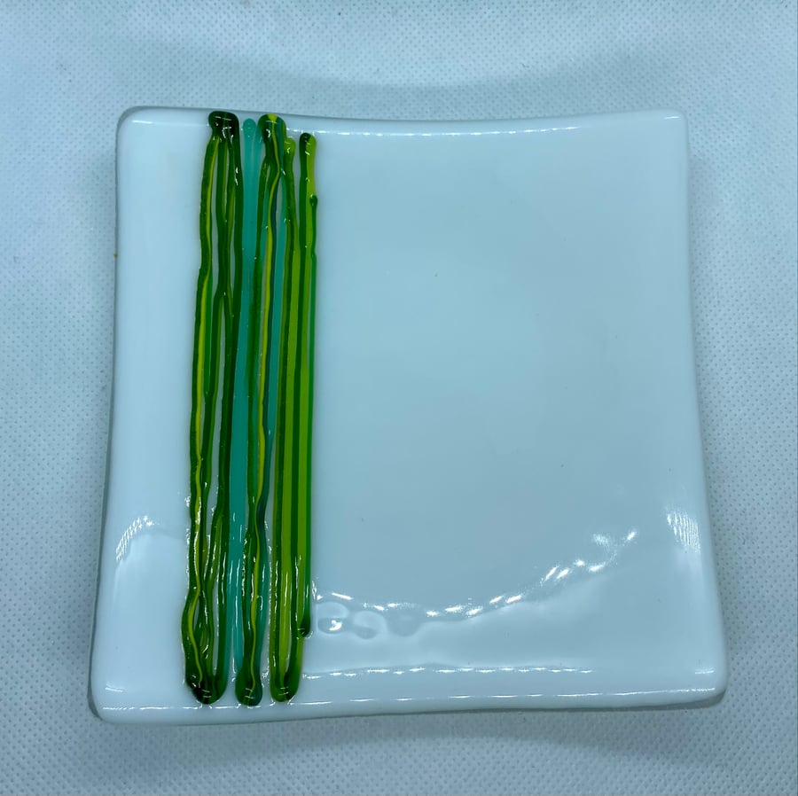 Fused glass dish in white with a striking green pattern
