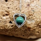 Small Green Malachite heart pendant necklace. Sterling silver.
