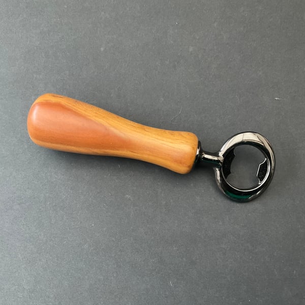 Plum wood bottle opener