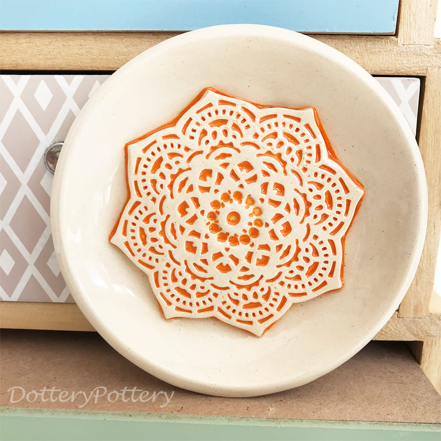 Small ceramic trinket dish with lace pattern orange