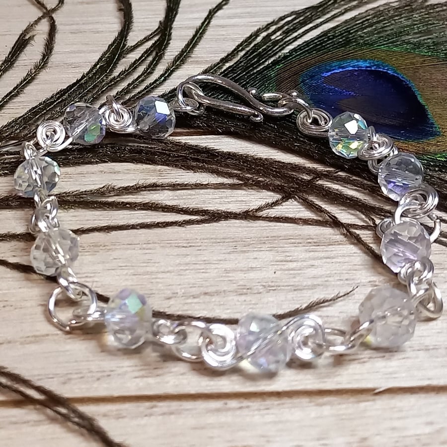 Twisted silver plated copper bracelet with crystals