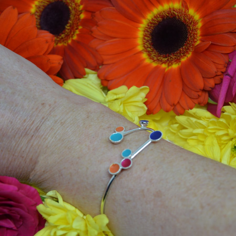 Sterling silver and turquoise, orange, pink and navy enamel adjustable bangle