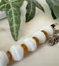 Glass bead bracelet in crisp white vintage beads with extension chain - Image 4