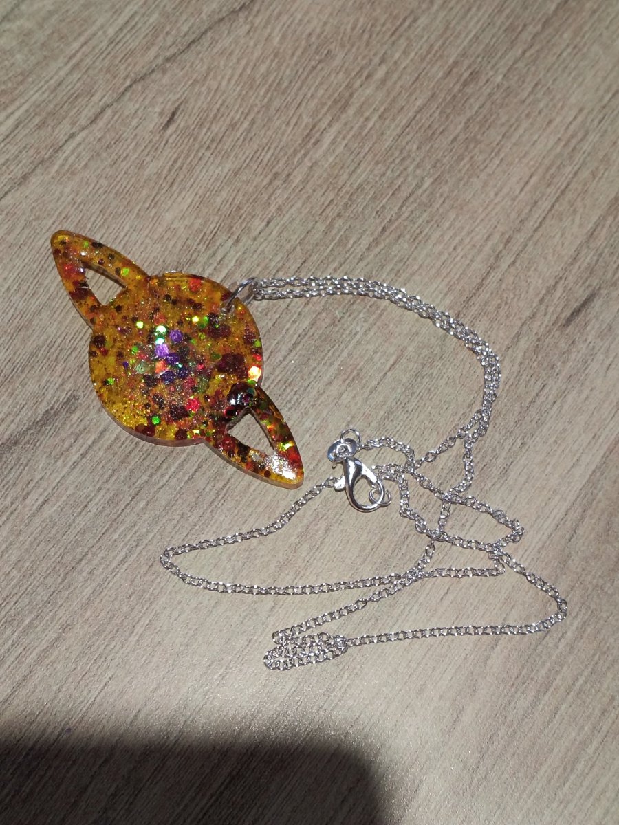 Beautiful handmade planet necklace with silver chain.  Pretty one off gift 