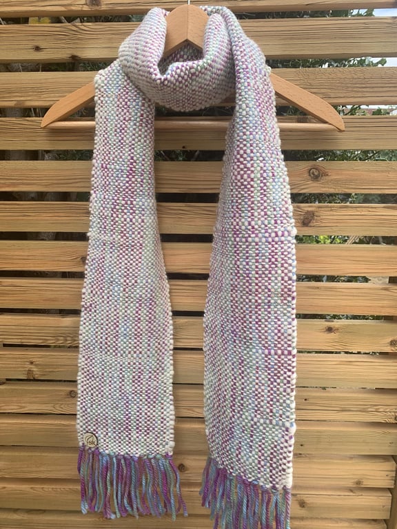 Handwoven cream, pink, green, blue and purple wool scarf