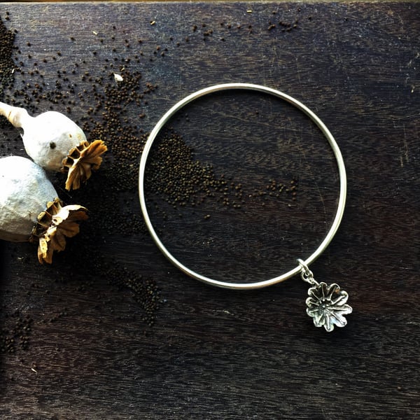 Sterling silver bangle with poppy seed head, poppy jewellery