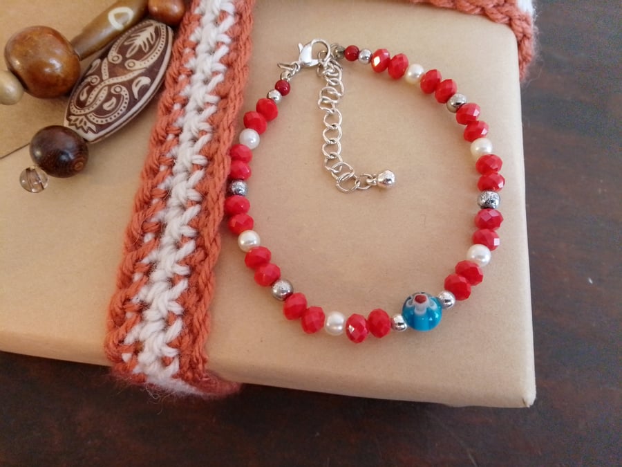 Handmade bracelet made using pre-loved beads.