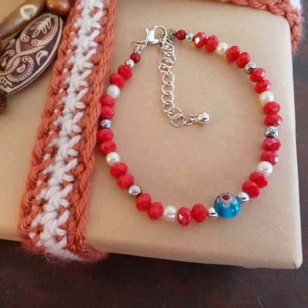 Handmade bracelet made using pre-loved beads.